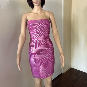 stylish bandage dress by Bebe seems and feels like Herve Leger. XS